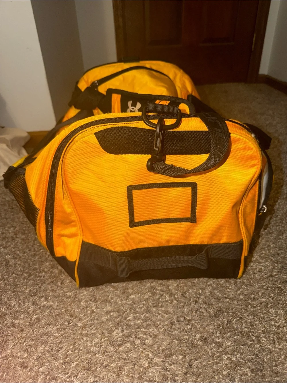 Under Armour Men's Orange Duffel Bag with Black Accents